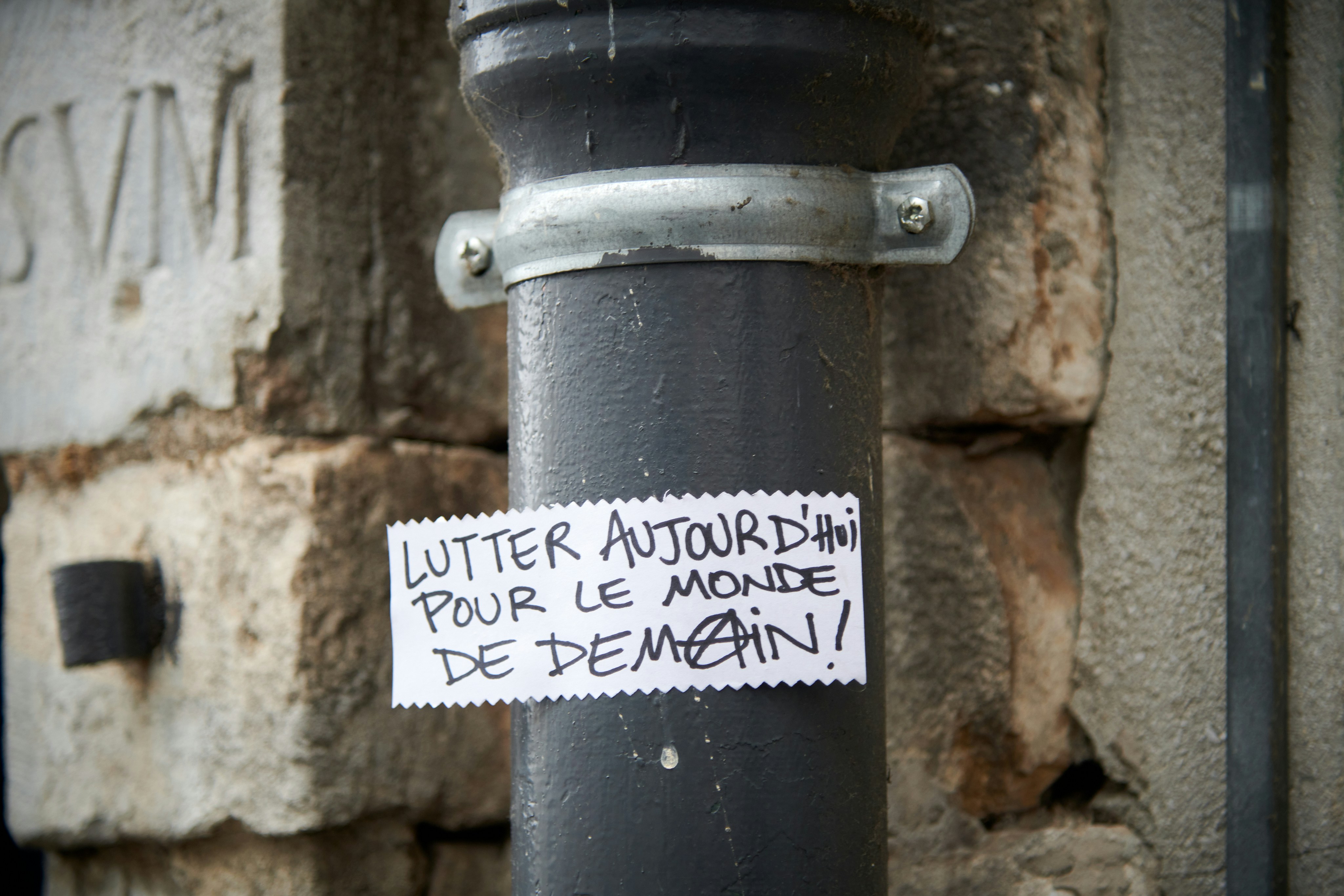 a street pole with a sign on it