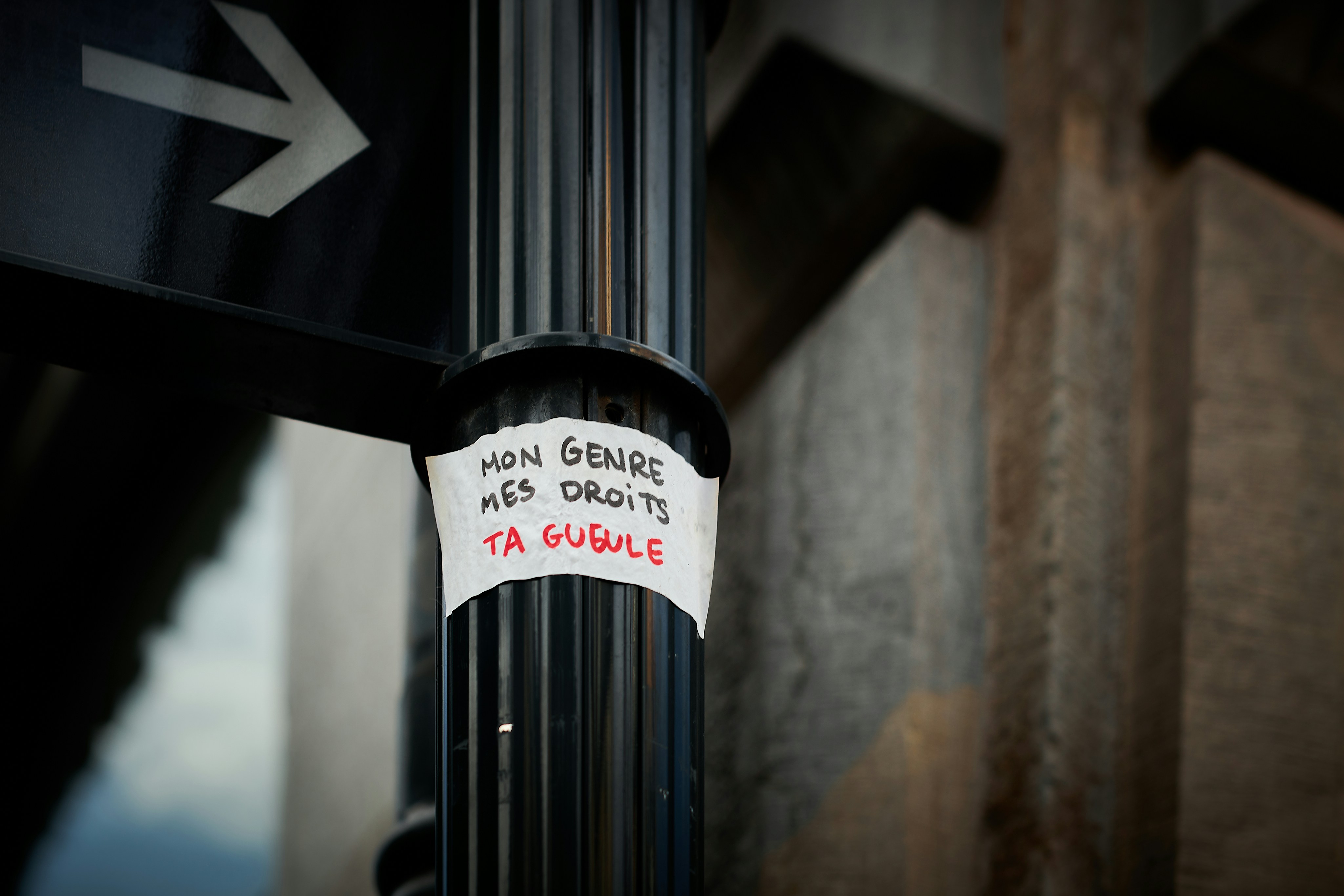 a close up of a pole with a sign on it