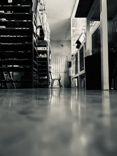 Image of cleaning staff organizing cleaning supplies in a storage room.