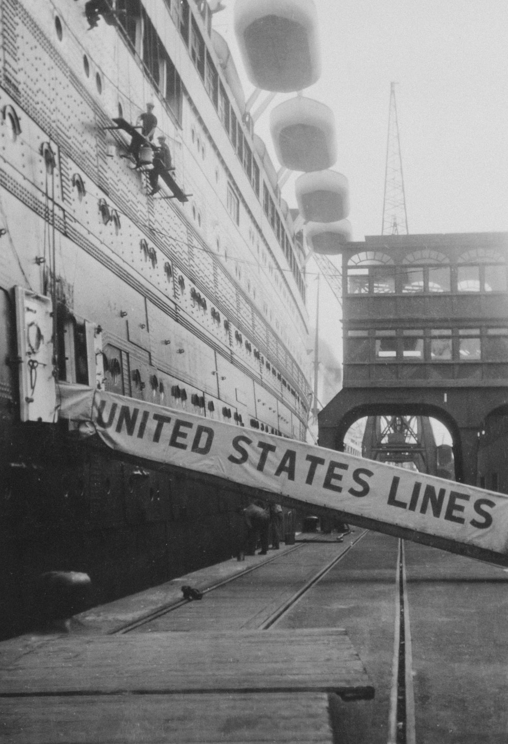 a black and white photo of a large ship