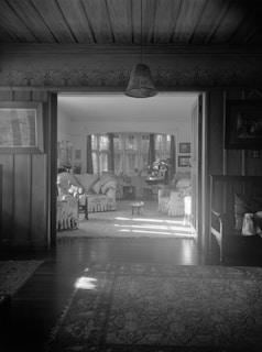 Sunlit room corner with vintage furniture and art pieces at Casa Bravo.