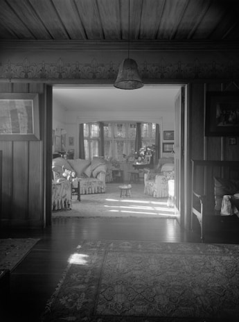 Sunlit room corner with vintage furniture and art pieces at Casa Bravo.