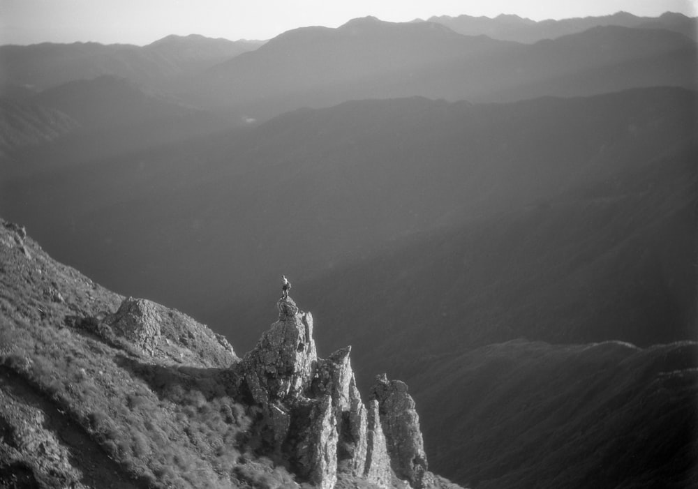 a black and white photo of a mountain range