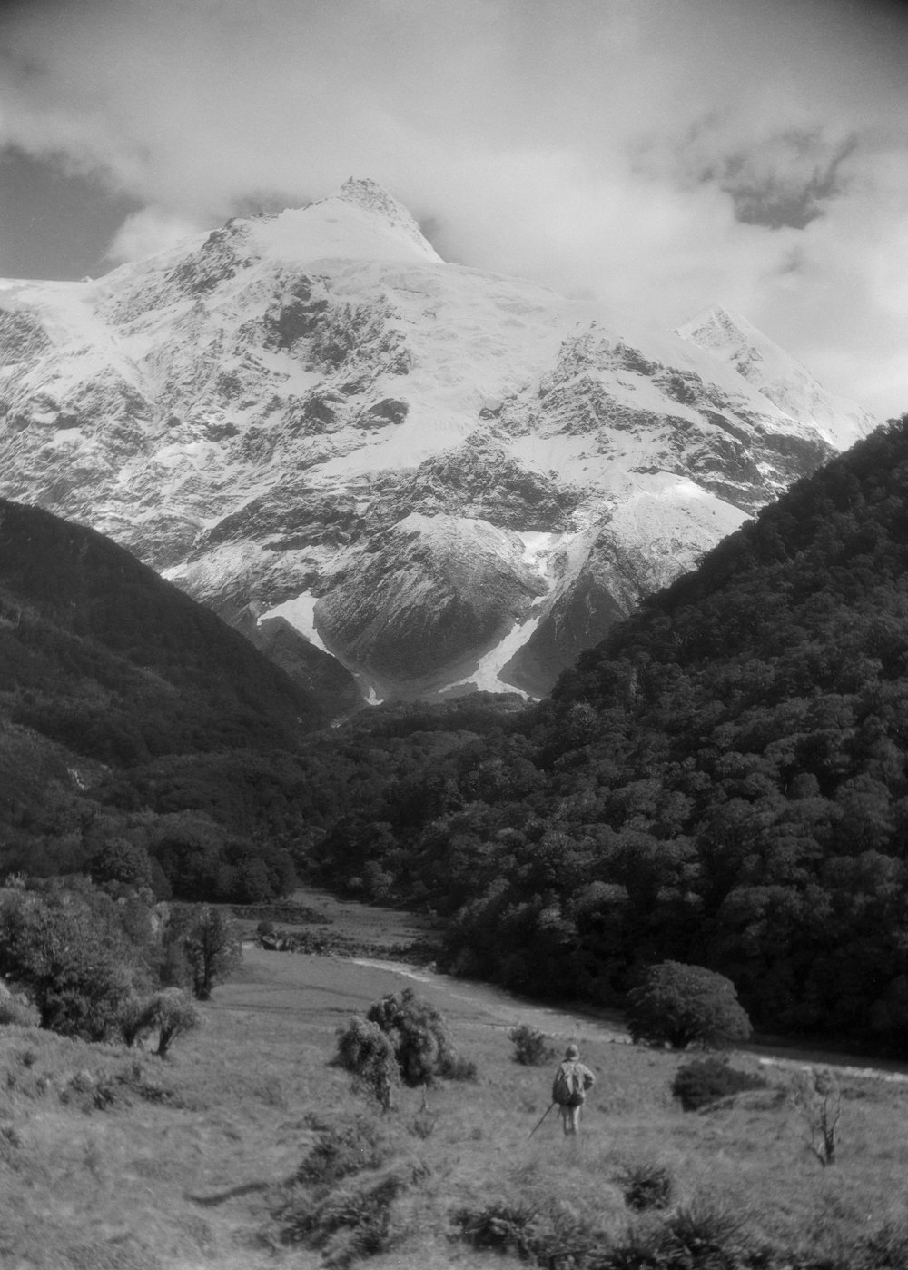 a black and white photo of a mountain range