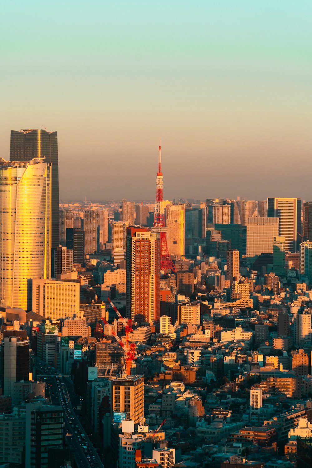 a view of a city with tall buildings