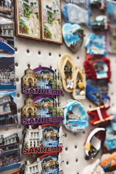 a bunch of magnets are on a wall