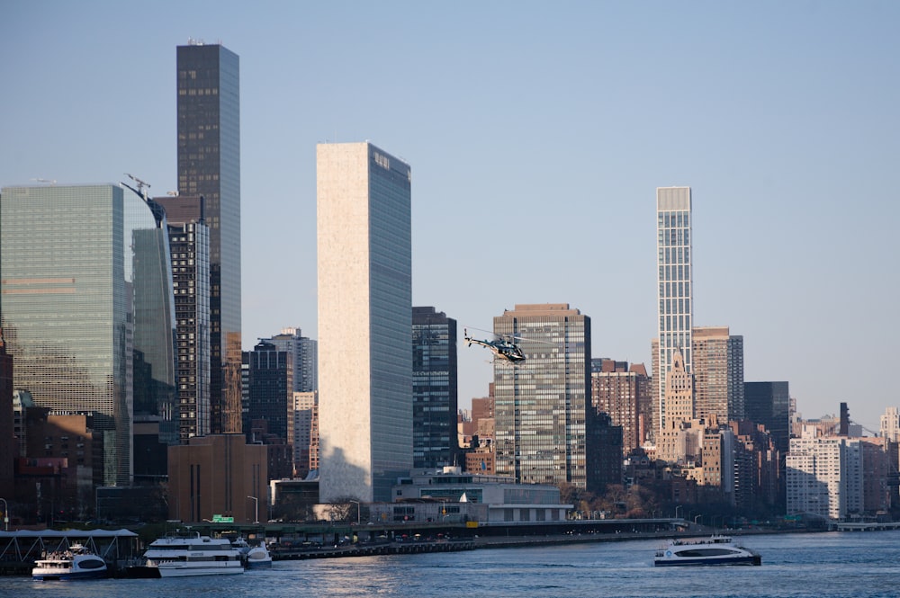 a large body of water with a city in the background