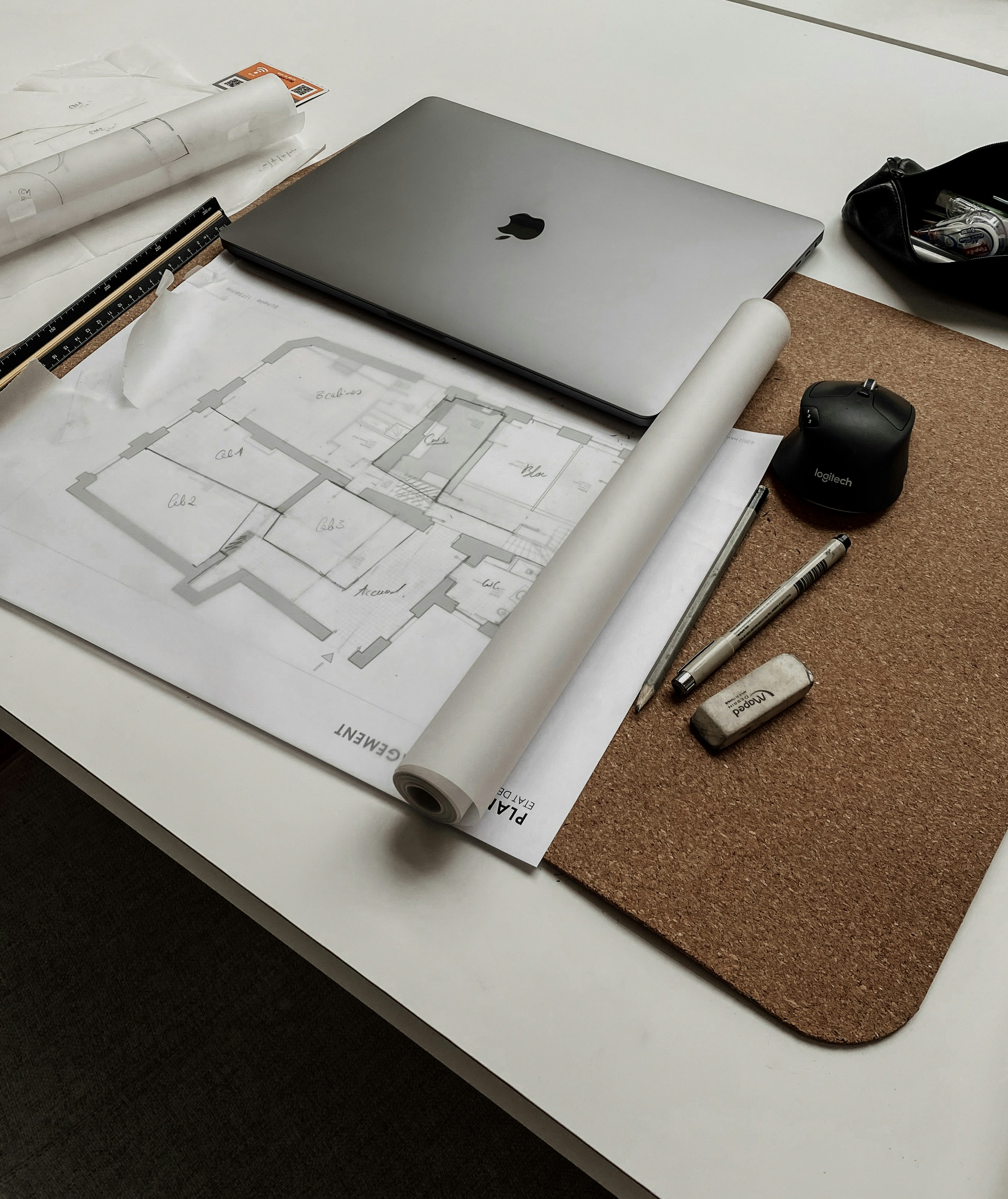 Architectural blueprints and construction plans with modern design tools