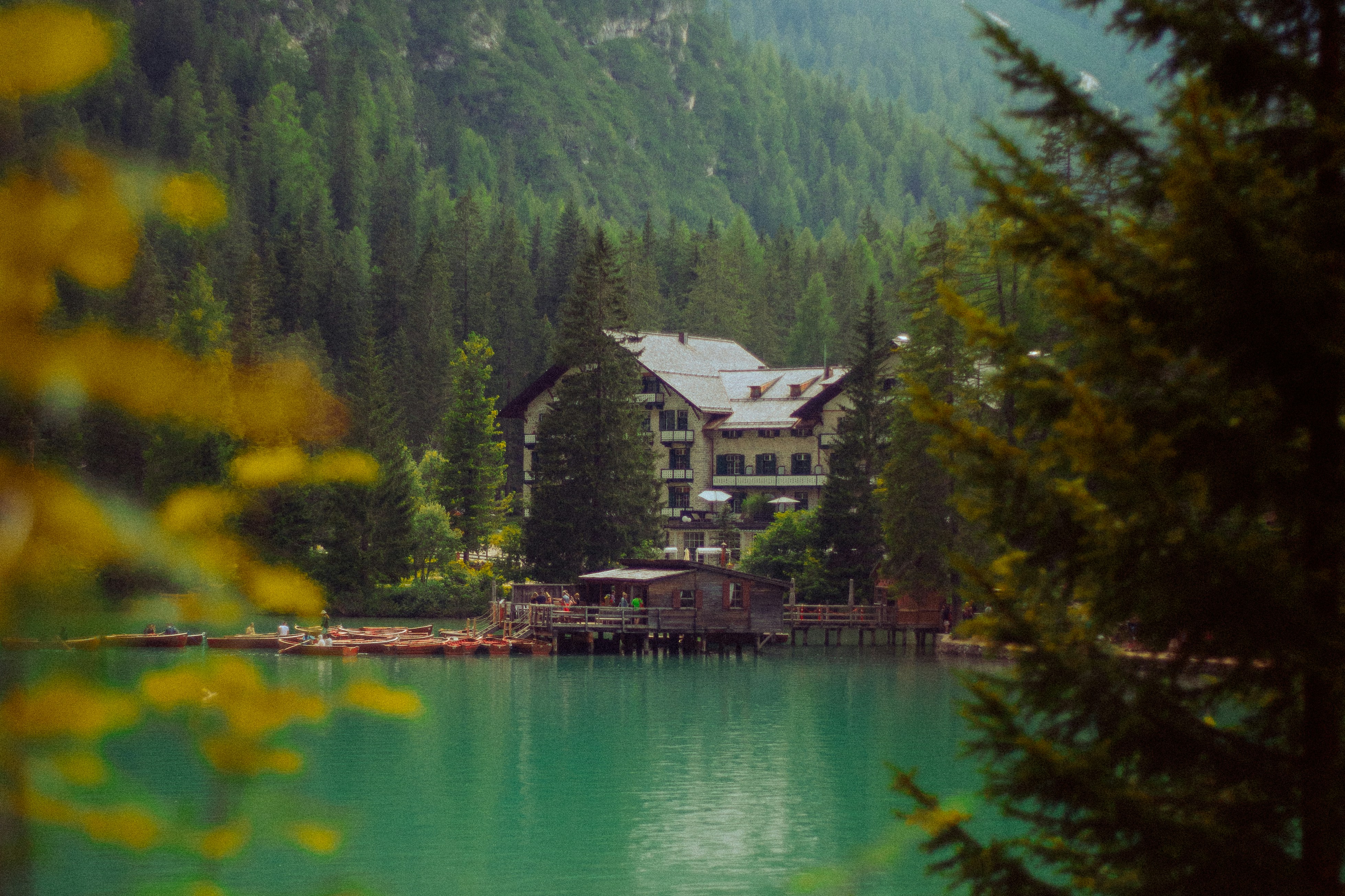 a large building sitting on top of a lake, 