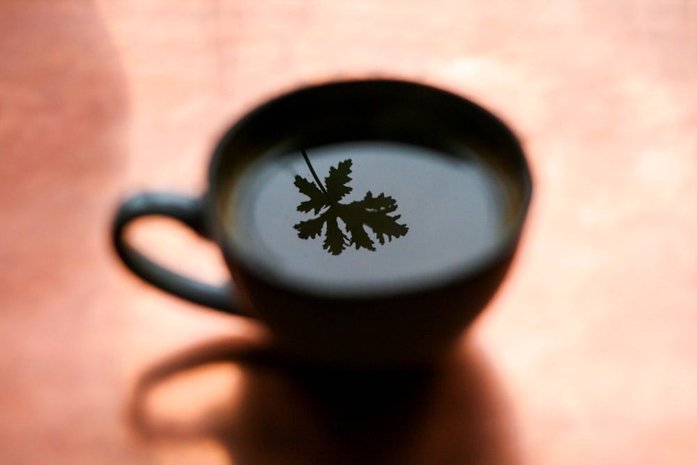 a close up of a cup on a table