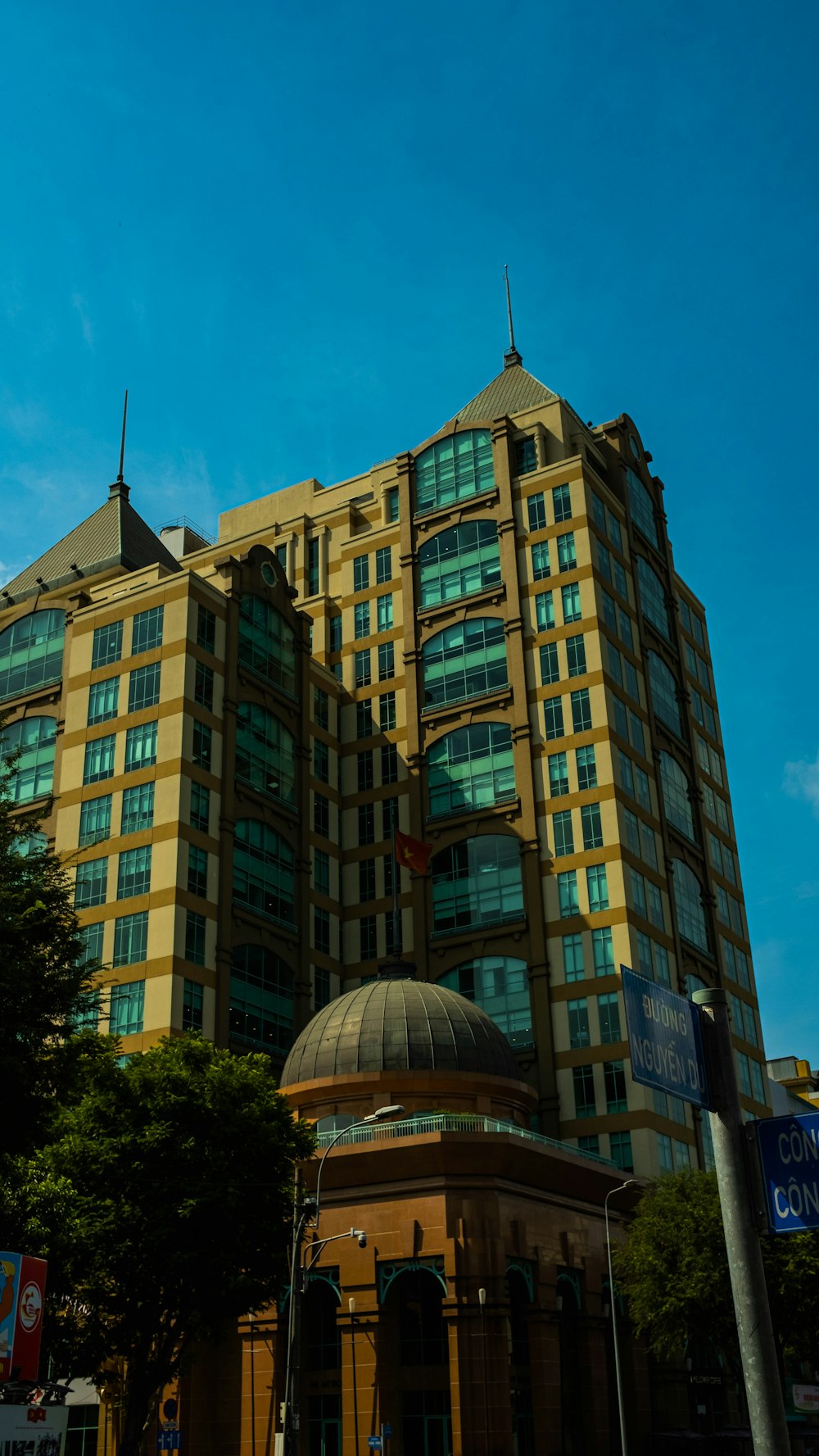 a tall building with a dome on top of it