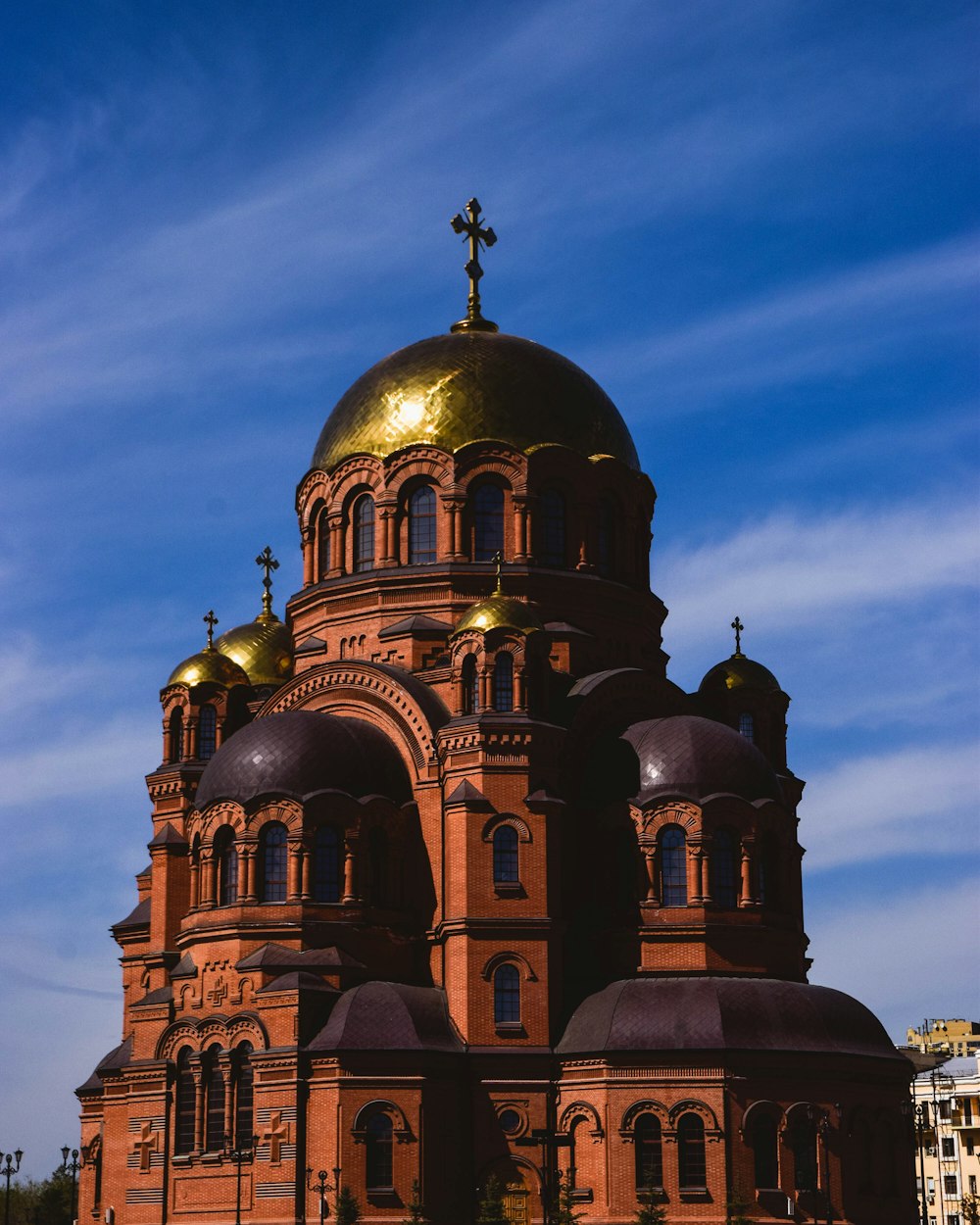 a large building with a golden dome on top of it