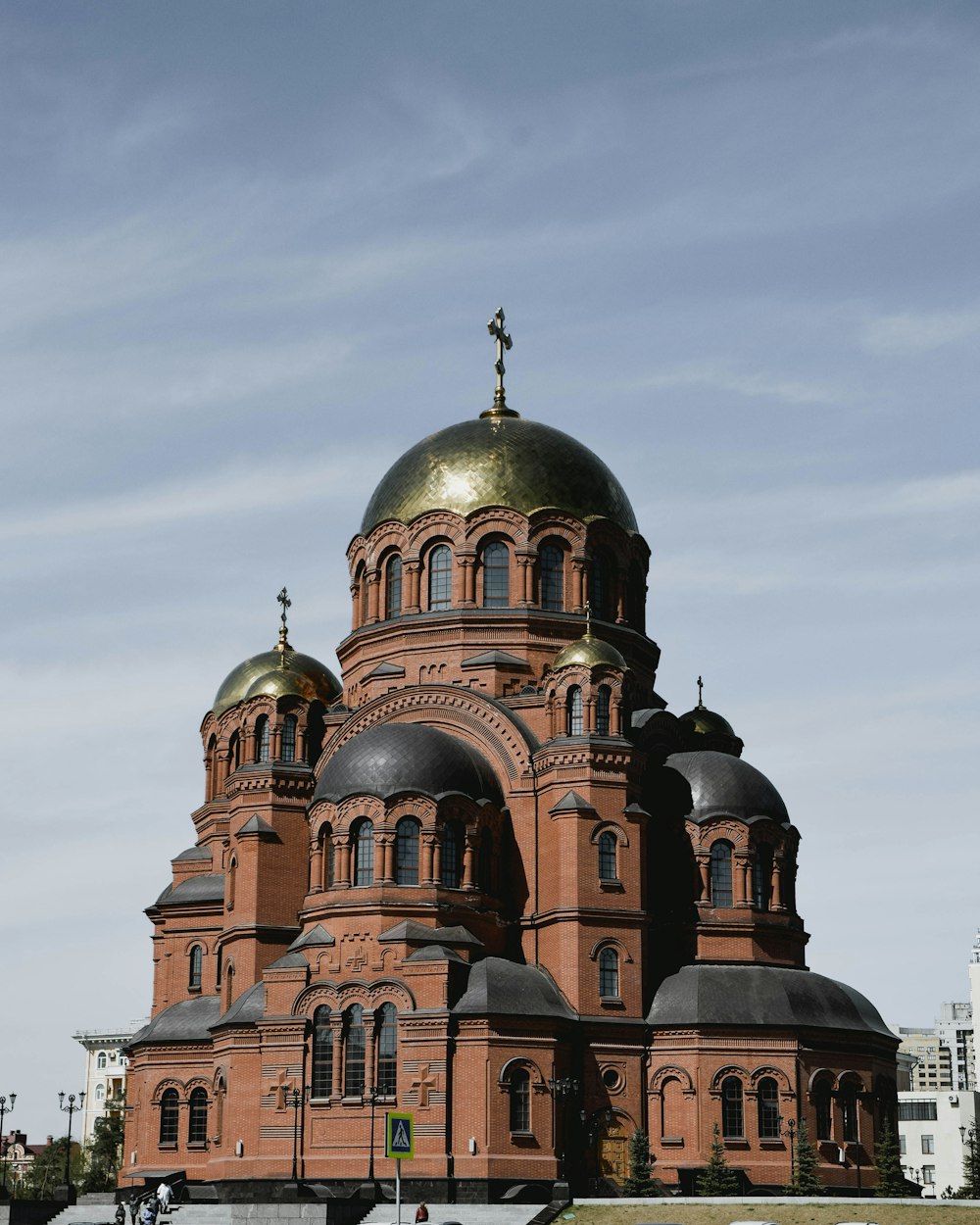 a large building with a golden dome on top of it