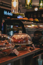 a counter with a variety of desserts on it