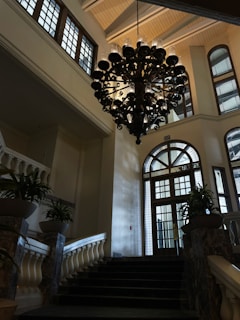 An elegant chandelier sparkling in a chic entryway, showcasing ledfloorgame quality.