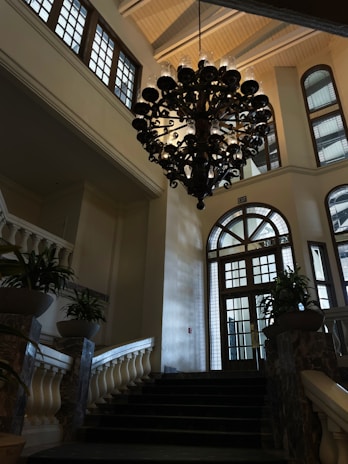 An elegant chandelier sparkling in a chic entryway, showcasing ledfloorgame quality.