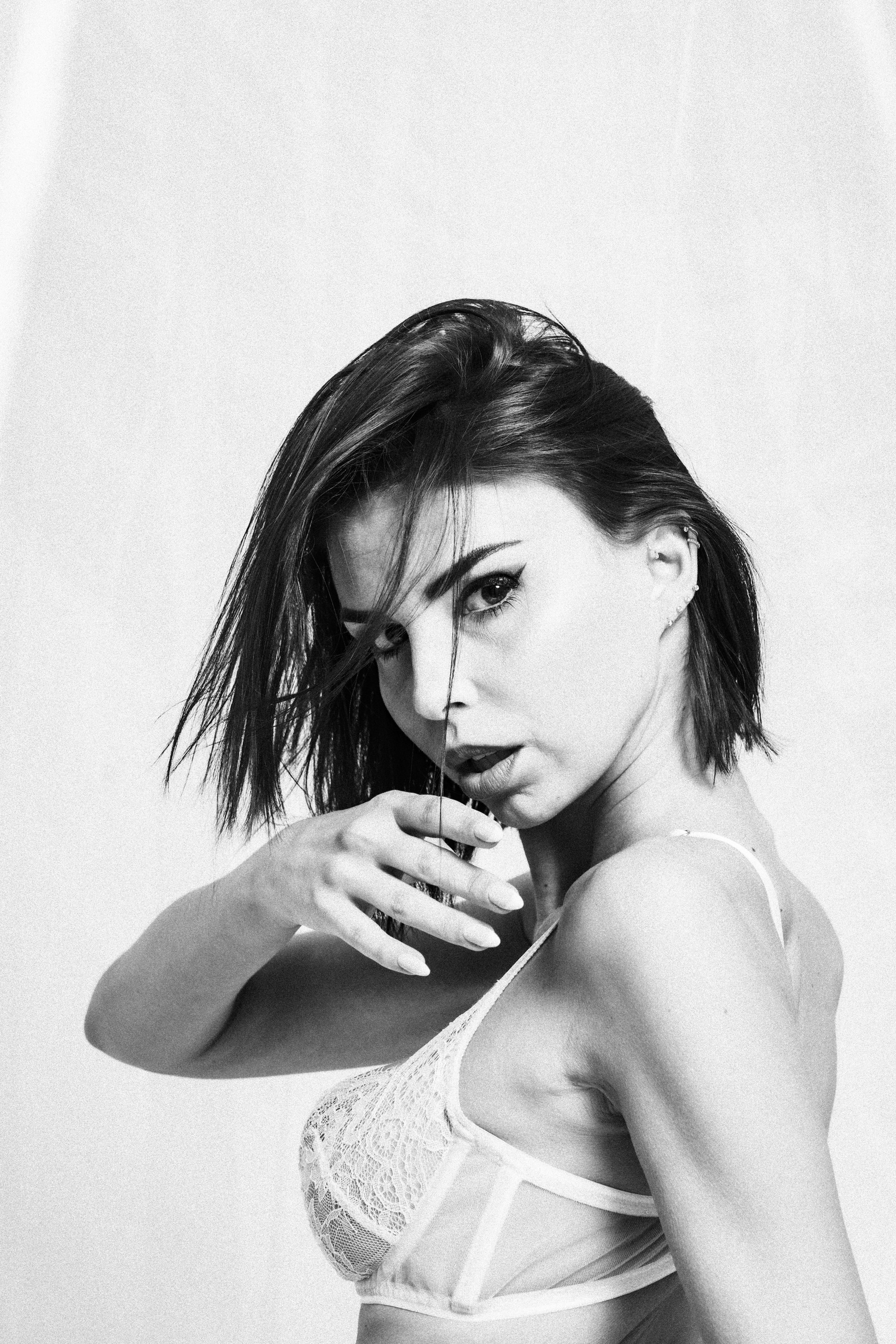 person wearing grey knit sweater