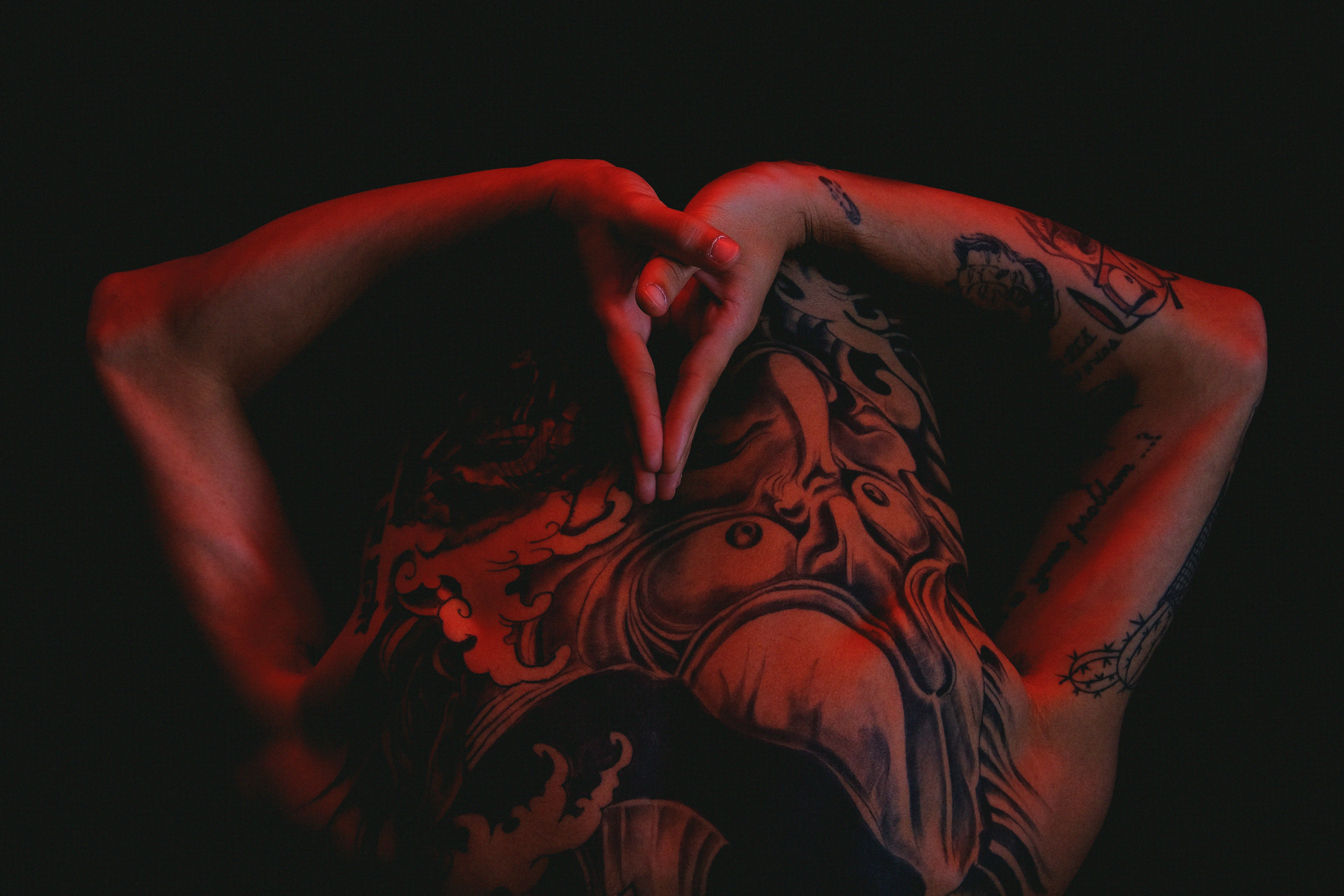 a woman with a tattoo on her back