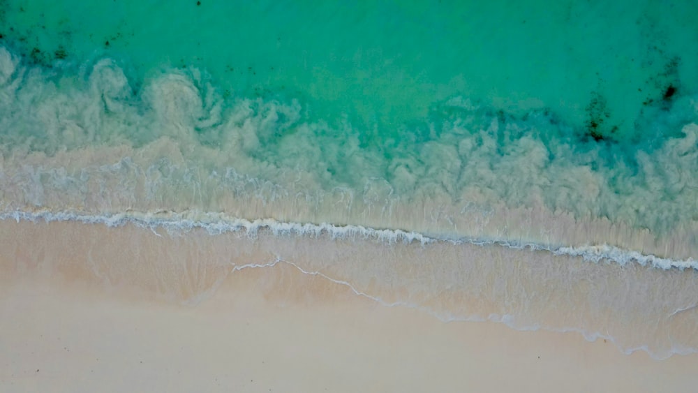 an aerial view of a beach and ocean