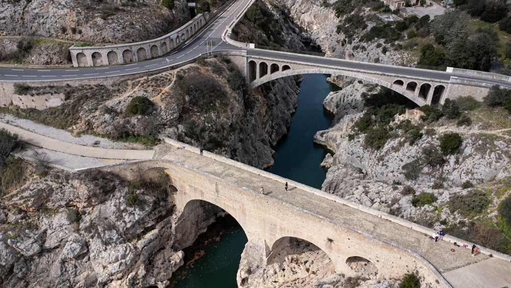 an aerial view of a bridge over a river