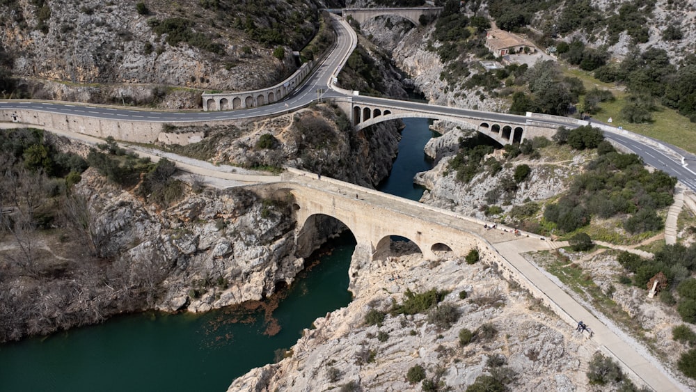 an aerial view of a bridge over a river