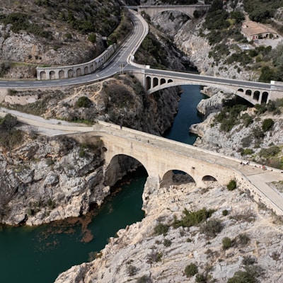 an aerial view of a bridge over a river