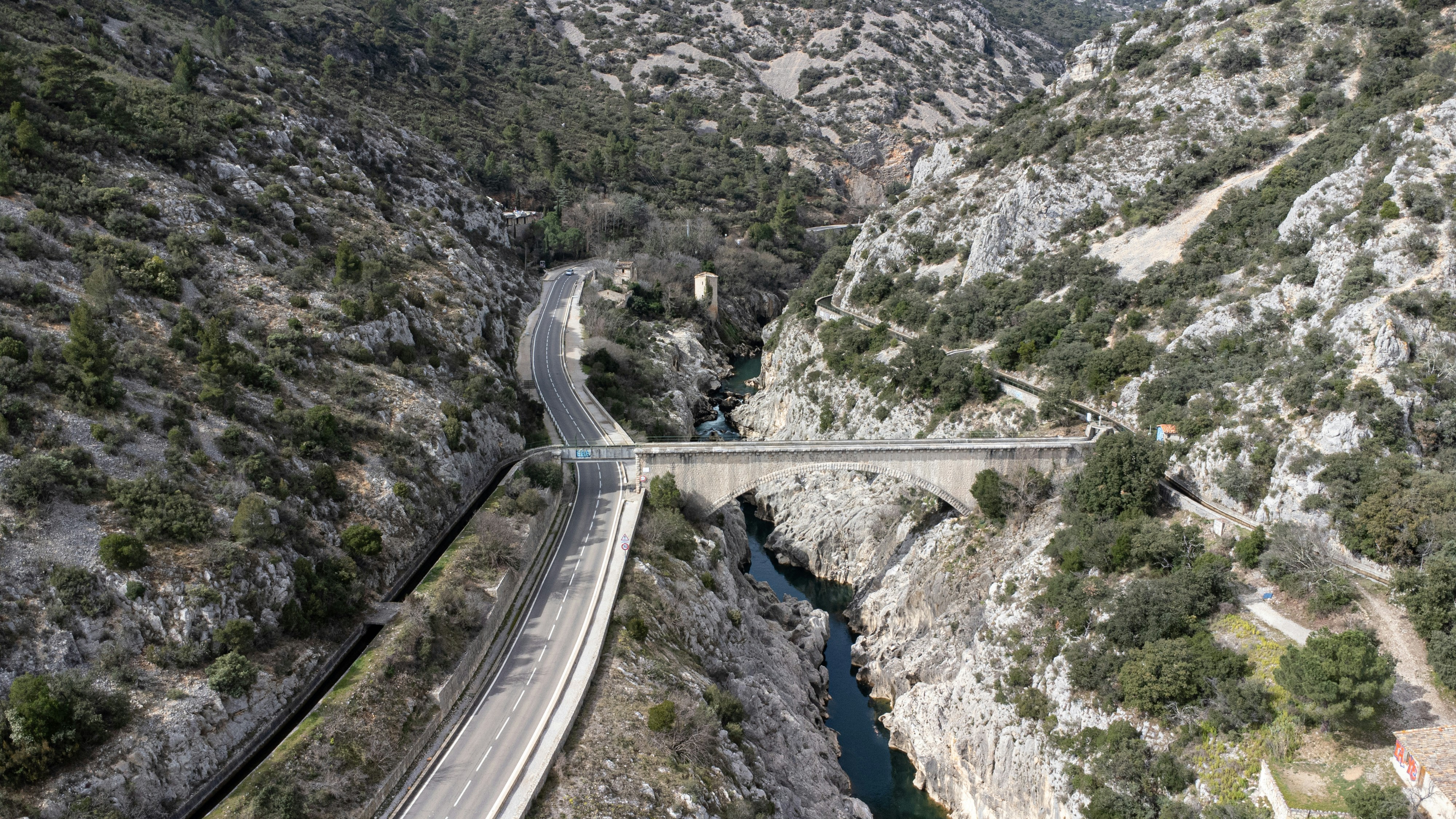 an aerial view of a bridge over a river, Valley of Hérault River, France