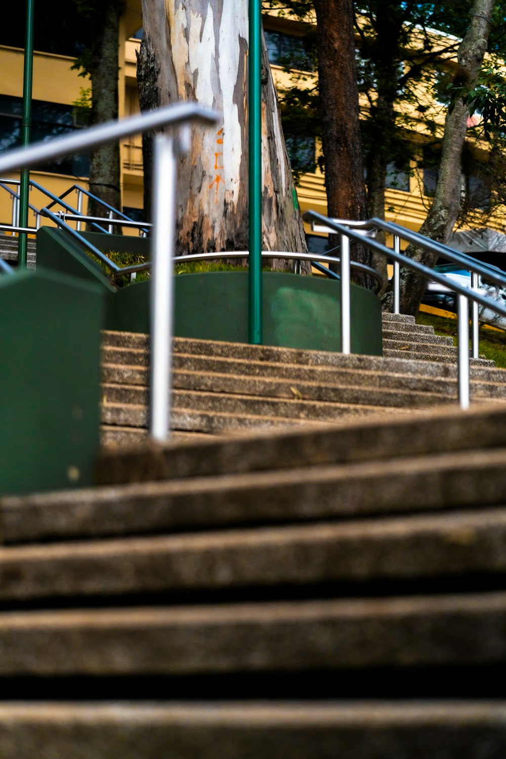 a man riding a skateboard down a set of stairs