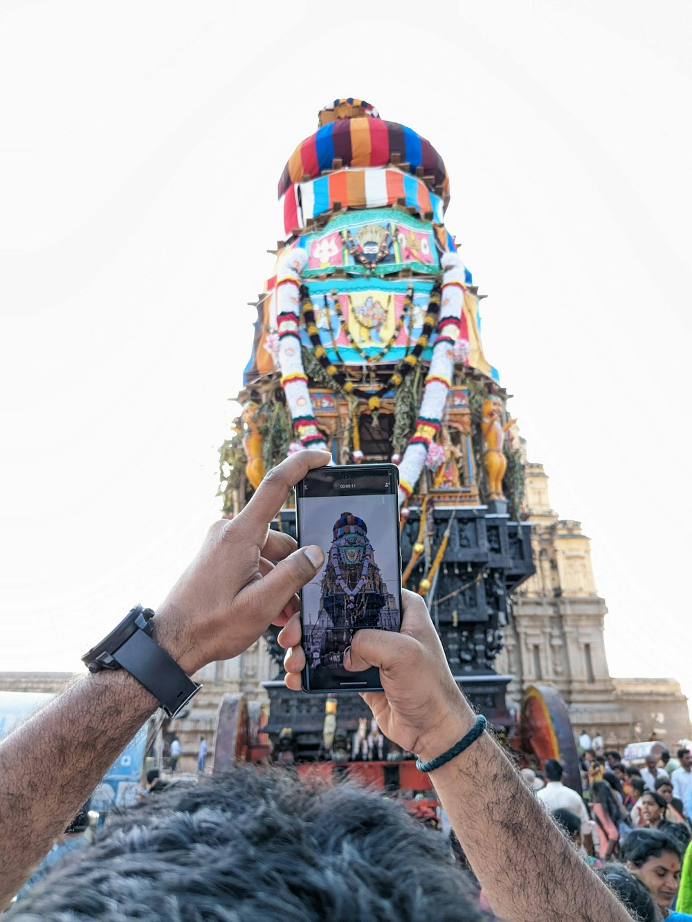 a person taking a picture of a float