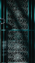 A beautifully crafted bespoke metal gate showcasing intricate designs.