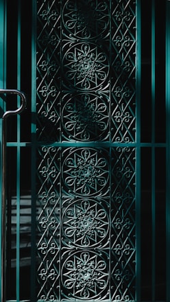 A beautifully crafted bespoke metal gate showcasing intricate designs.