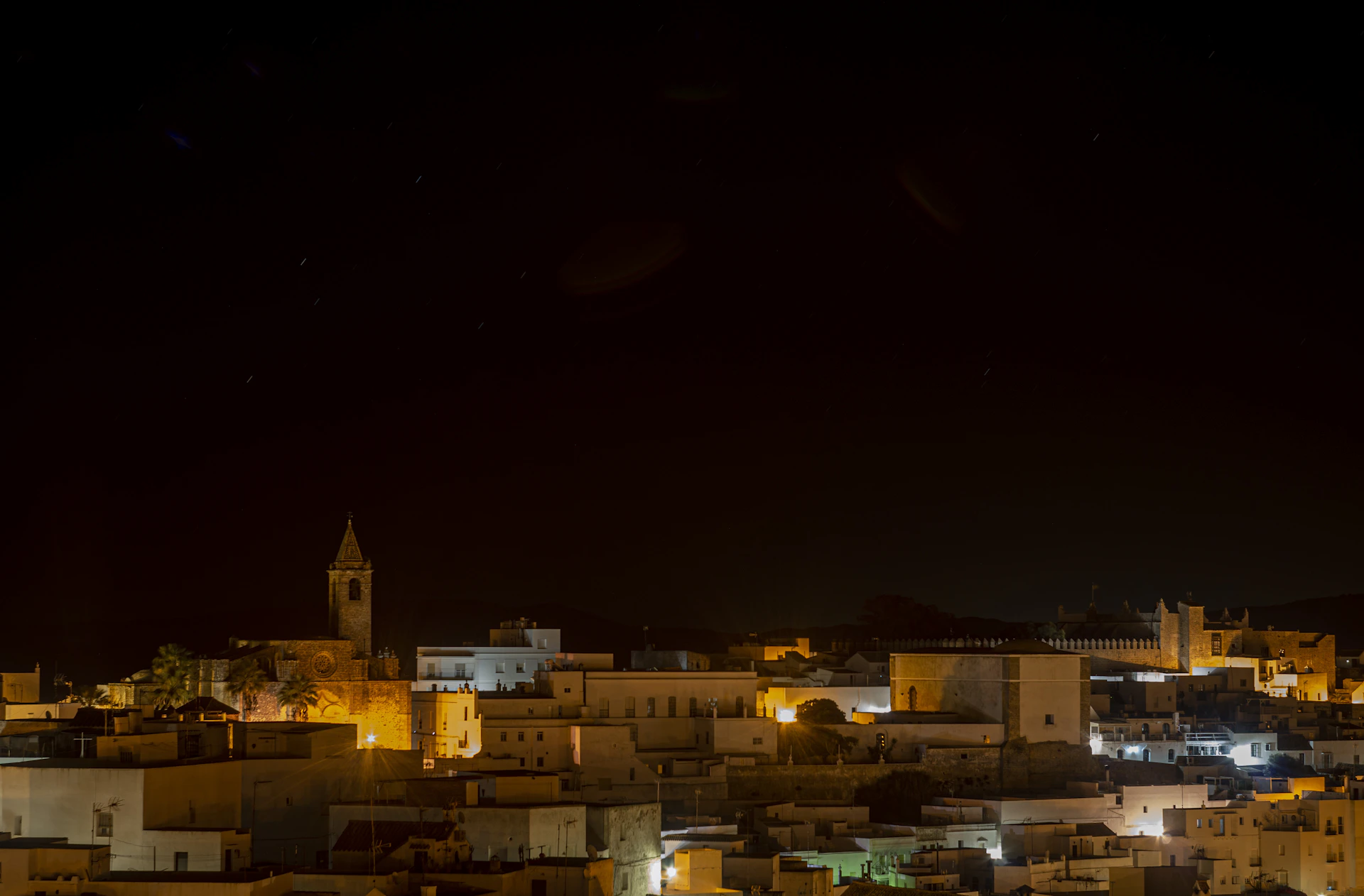Panoramic view of a historic Minas Gerais town square captured in soft natural light.