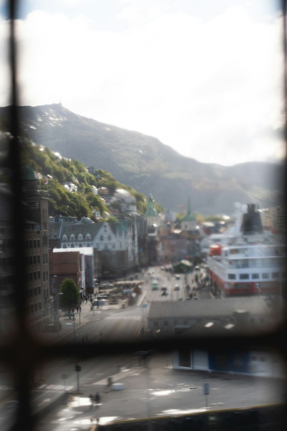 a view of a city through a window