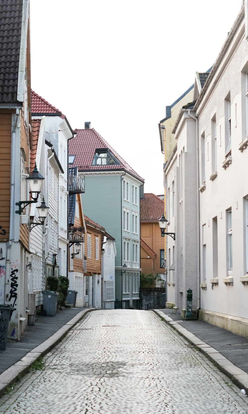 a cobblestone street in a european city