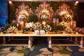 An elegant buffet spread featuring fresh seasonal dishes with gold detailing.