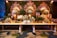 A beautifully arranged buffet table featuring various dishes in elegant brass containers.