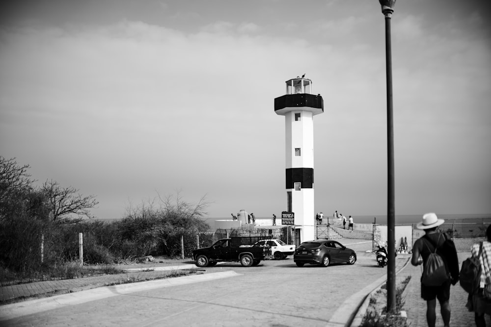 a black and white photo of a light house