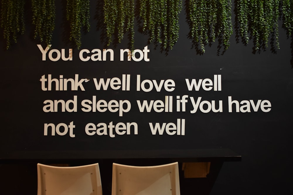 a sign that says you can not think well love well and sleep well you have