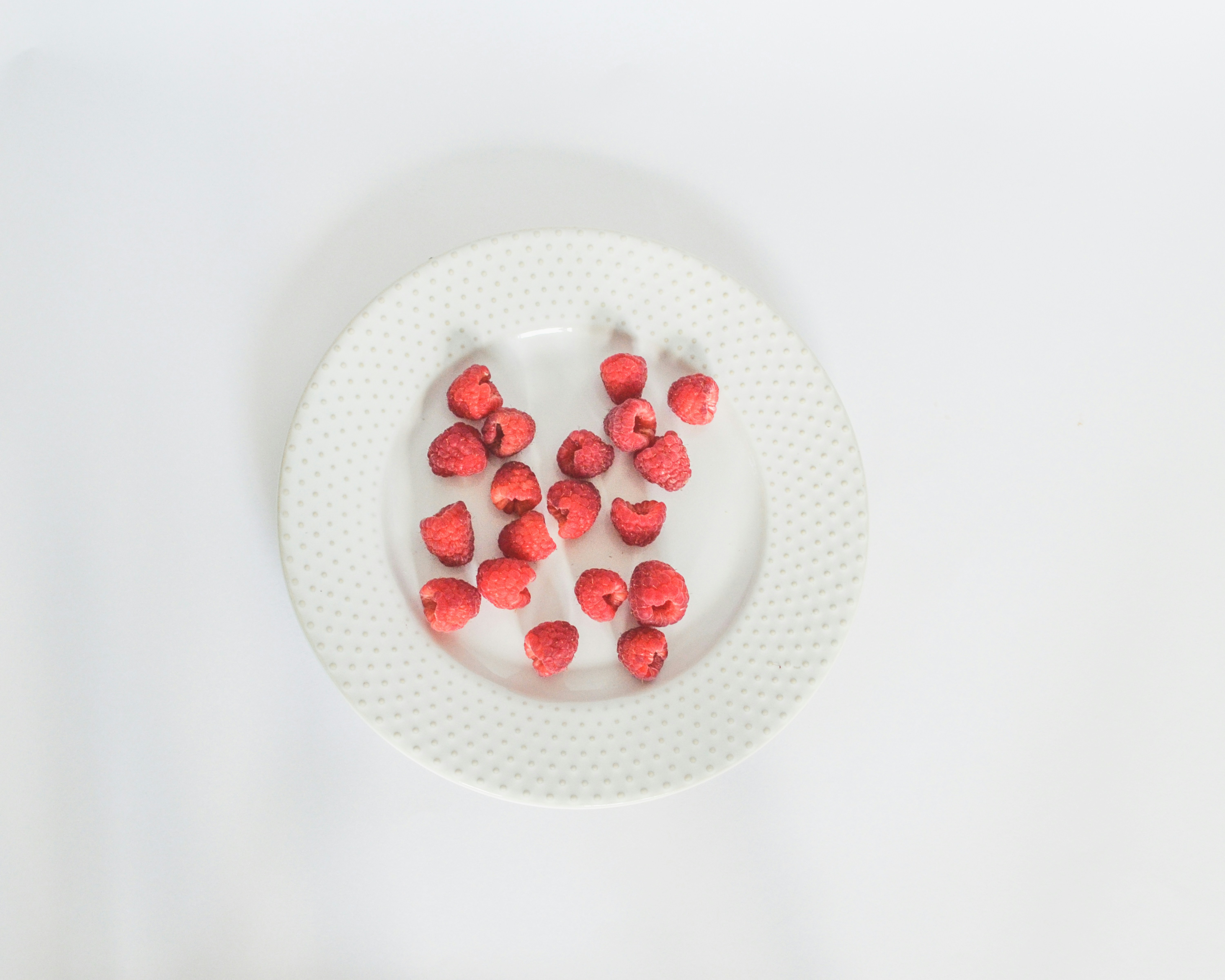 White plate with strawberries