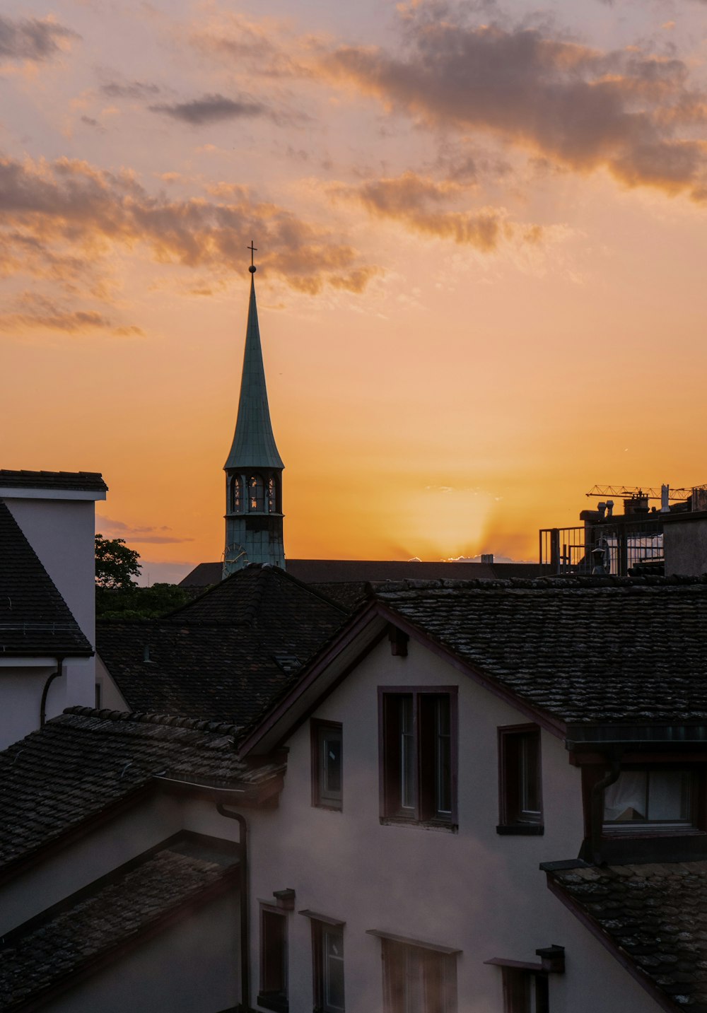 a building with a steeple and a clock tower