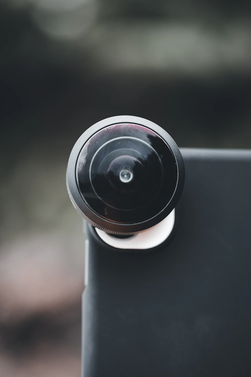 Clip-on wide-angle lens on a smartphone