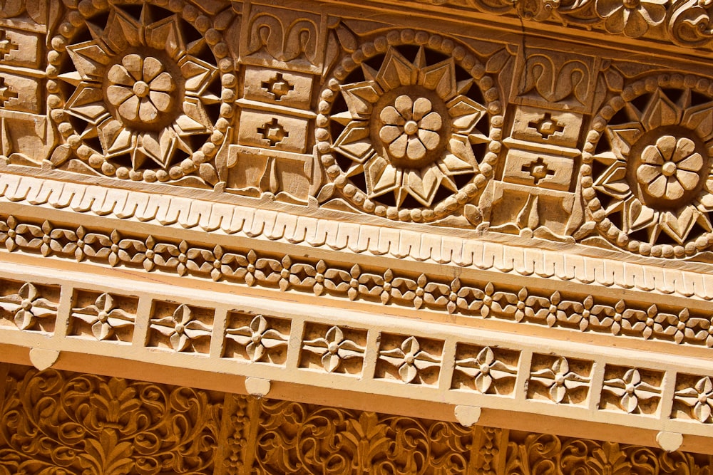 a close up of a decorative design on a building