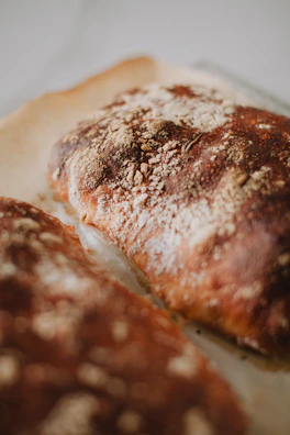 Close-up of a freshly baked rustic French bread with a golden crust.
