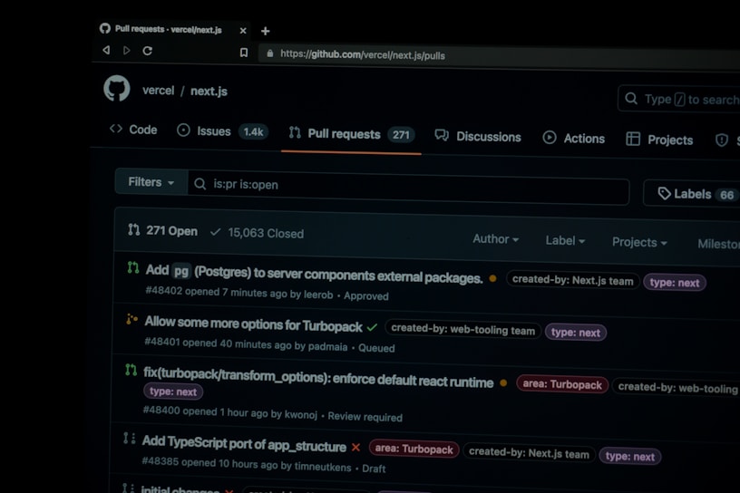 A screenshot of the GitHub pull requests page for the 'vercel/next.js' repository. The page displays a search box, filters, and four open pull requests with details such as titles, authors, labels, and activity timestamps. The top of the page has navigation links including Code, Issues, Pull requests, Discussions, Actions, Projects, and more.
