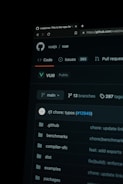 A screenshot of a GitHub repository page featuring the vue/vue project. The page shows various tabs such as Code, Issues, and Pull Requests. It highlights the number 365 under Issues. There is a list of folders including .github, benchmarks, compiler-sfc, dist, examples, and packages visible in the directory.