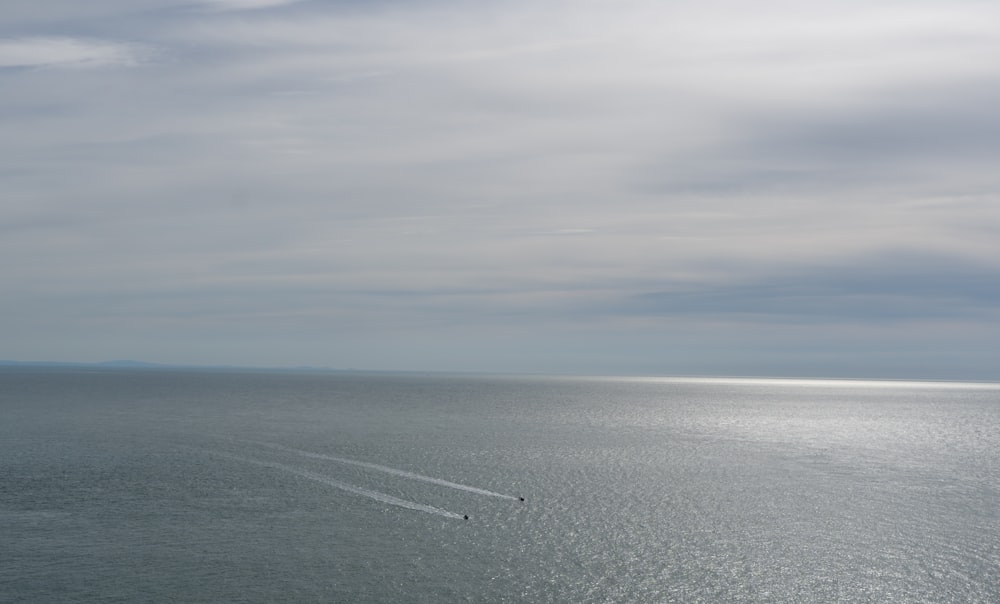 a boat is out in the open water