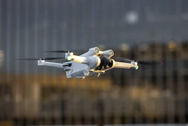 A drone pilot consulting with a lawyer over FAA compliance documents