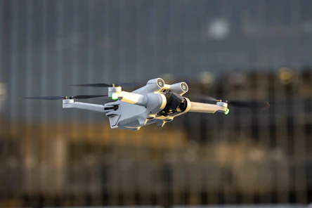 A drone capturing aerial footage of a cityscape.