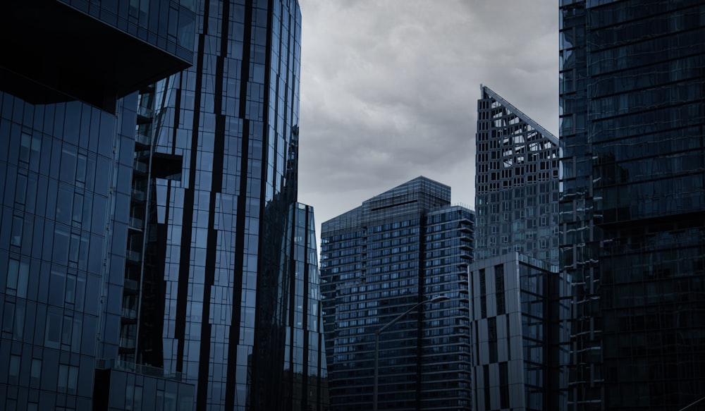 a group of tall buildings sitting next to each other