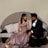 A happy couple enjoying a luxurious evening with Gusi.